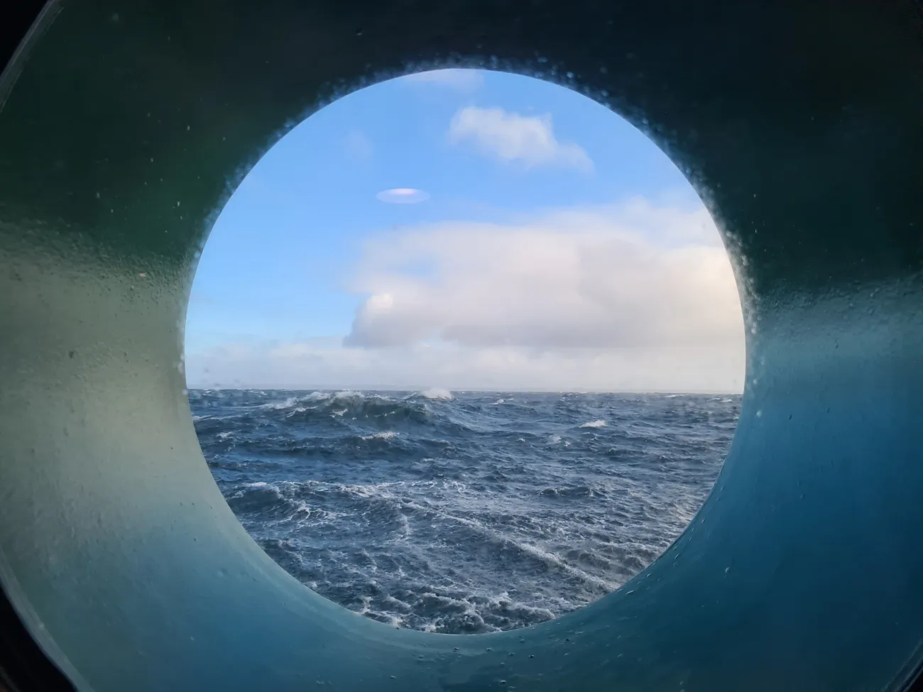 Ocean seen from a ship's window